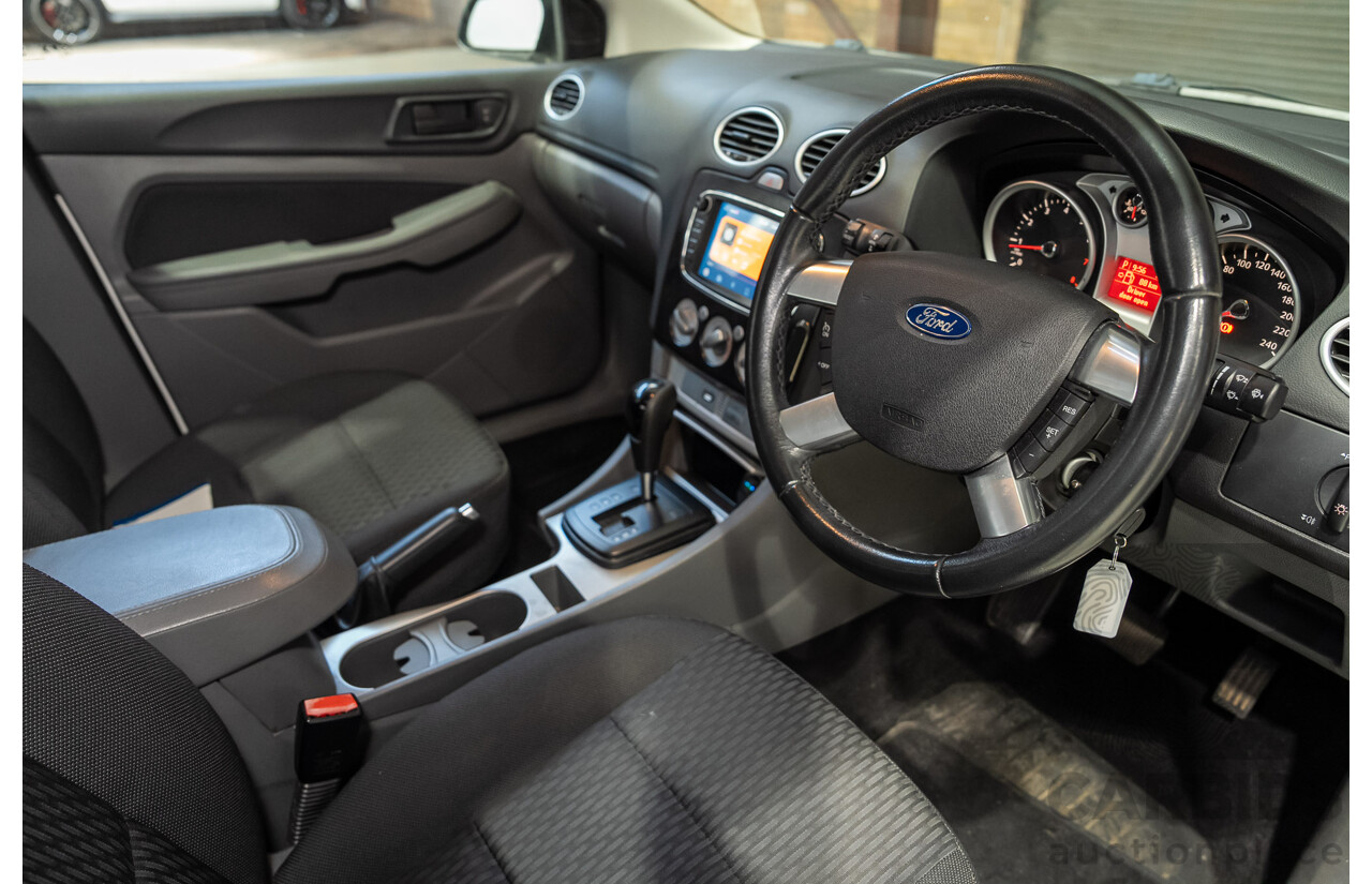 03/2010 Ford Focus LX FWD LV 5d Hatchback White 2.0L