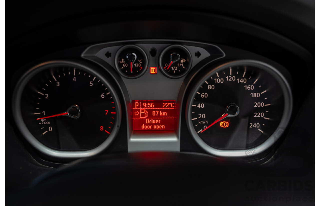 03/2010 Ford Focus LX FWD LV 5d Hatchback White 2.0L