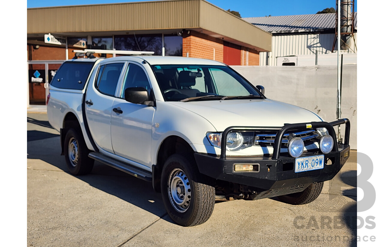 09/2009 Mitsubishi Triton GLX (4x4) MN MY10 Double Cab Utility White 2.5L