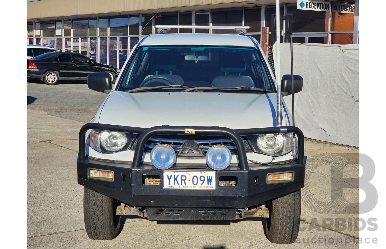 09/2009 Mitsubishi Triton GLX (4x4) MN MY10 Double Cab Utility White 2.5L