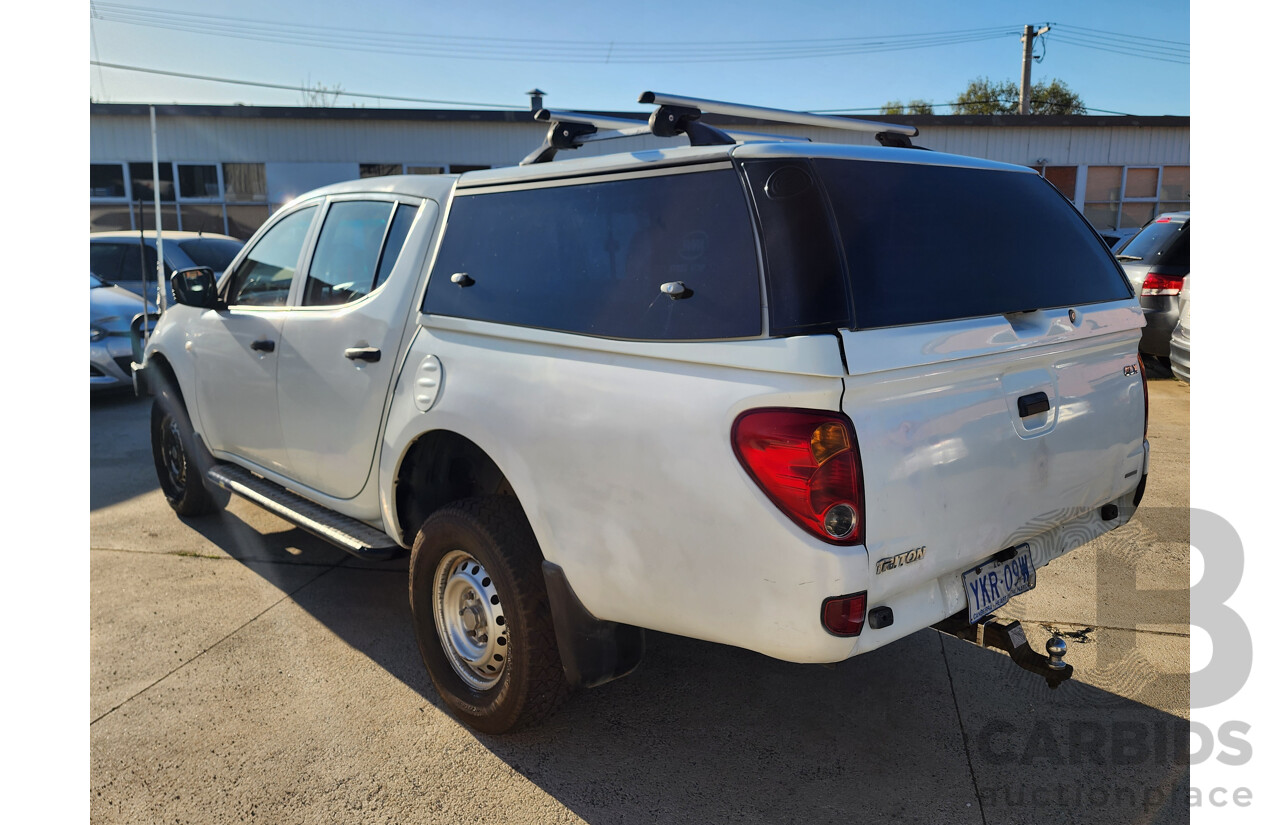 09/2009 Mitsubishi Triton GLX (4x4) MN MY10 Double Cab Utility White 2.5L