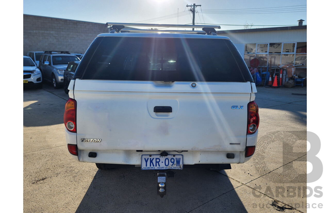 09/2009 Mitsubishi Triton GLX (4x4) MN MY10 Double Cab Utility White 2.5L