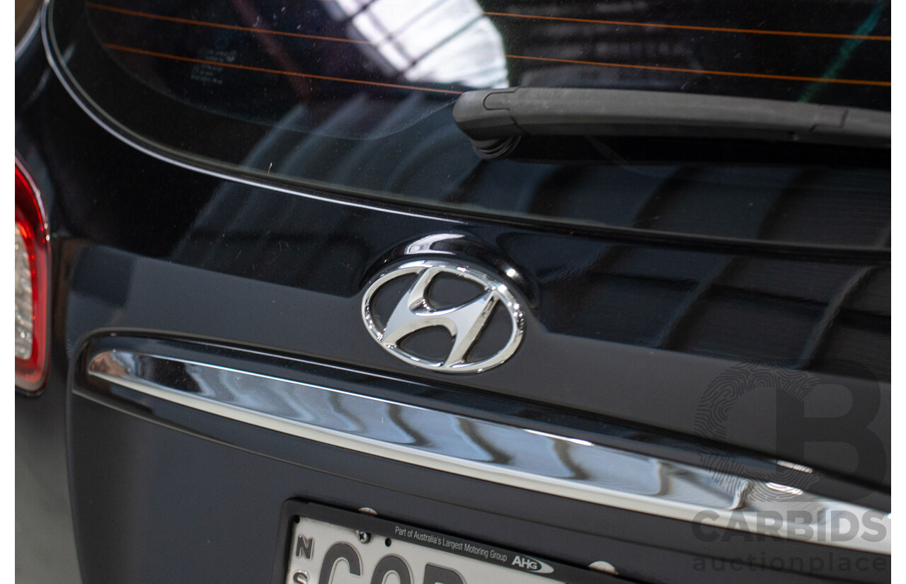 07/2012 Hyundai Santa Fe SLX CRDi (4x4) CM MY12 4d Wagon Black 2.2L 7 Seater