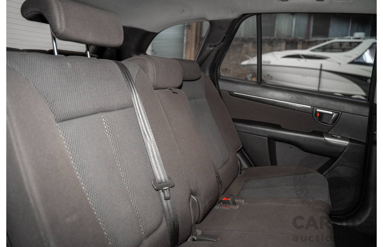 07/2012 Hyundai Santa Fe SLX CRDi (4x4) CM MY12 4d Wagon Black 2.2L 7 Seater