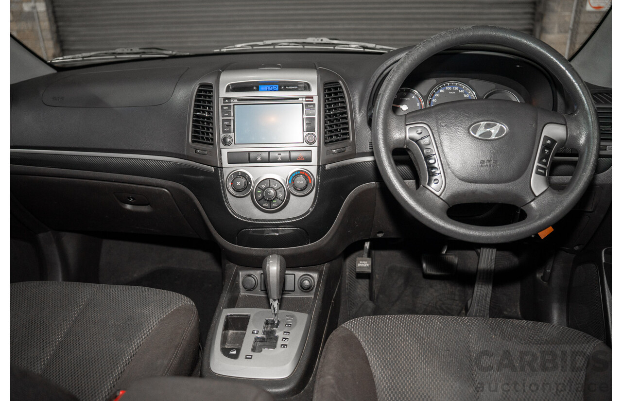 07/2012 Hyundai Santa Fe SLX CRDi (4x4) CM MY12 4d Wagon Black 2.2L 7 Seater