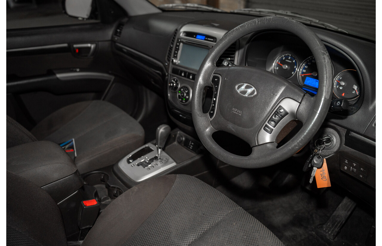07/2012 Hyundai Santa Fe SLX CRDi (4x4) CM MY12 4d Wagon Black 2.2L 7 Seater