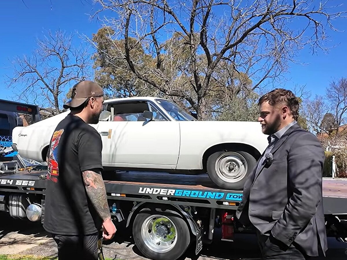 Inspecting the Charger with CARBIDS CEO Ben Hastings (right).